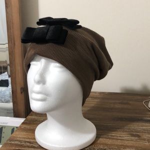 Velvet bow accented beanie